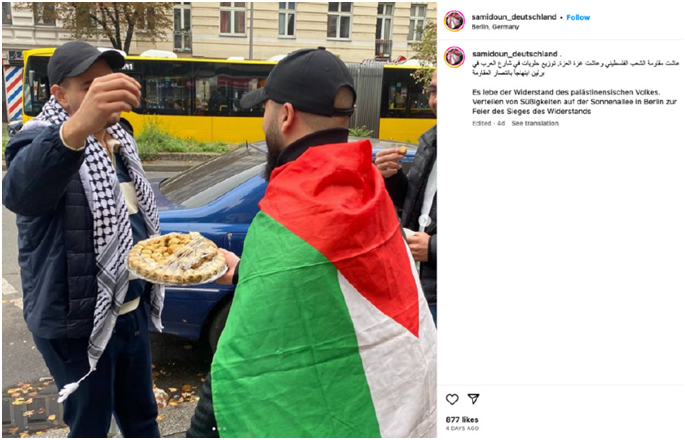 Posting auf dem Instagram-Profil von „Samidoun Deutschland“ am 7. Oktober 2023 zum Verteilen von Süßigkeiten auf der Sonnenallee in Berlin, mit dem die Terrorangriffe der HAMAS auf Israel gefeiert wurden. (Quelle: Instagram) Posting auf dem Instagram-Profil von „Samidoun Deutschland“ am 7. Oktober 2023 zum Verteilen von Süßigkeiten auf der Sonnenallee in Berlin, mit dem die Terrorangriffe der HAMAS auf Israel gefeiert wurden.