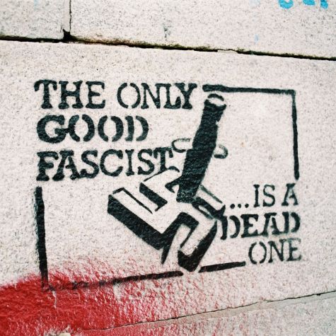 The photo shows an anti-fascist graffiti on a stone wall